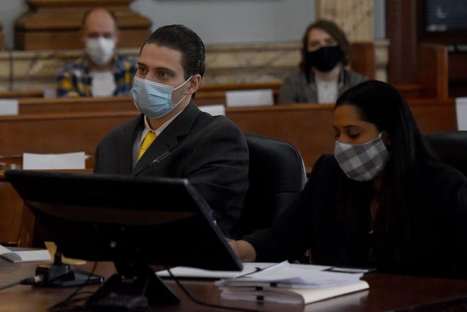 Harley David Michael Morgan, 21, of Newark, sits with Defense attorneyÊPriya Tamilarasan during opening statements on Tuesday, March 9, 2021. Morgan is accused of stabbing a woman over 20 times in front of her young children.