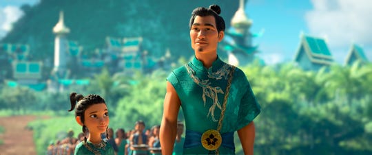 Benja (voiced by Daniel Dae Kim), right, is the father of Raya (voiced by Kelly Marie Tran) in Disney's "Raya and the Last Dragon."