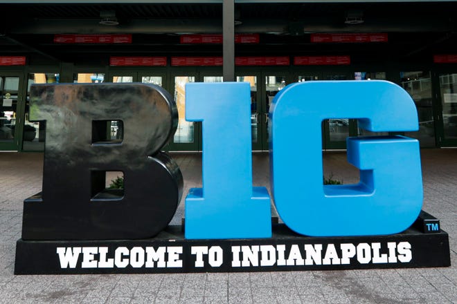 Big Ten signage is shown outside The Bankers Life Fieldhouse in Indianapolis, in this March 12, 2020, file photo. Games will be played March 10-14 at Lucas Oil Stadium, which also will be the site of this year's Final Four.