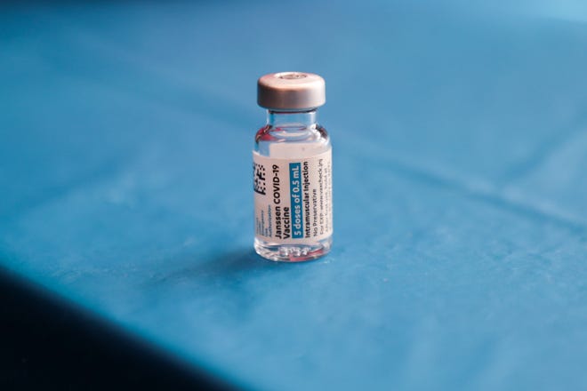 A vile of the Johnson & Johnson COVID-19 vaccine sits on a table at a Palm Springs Unified School District vaccine clinic on Wednesday, March 10, 2021.