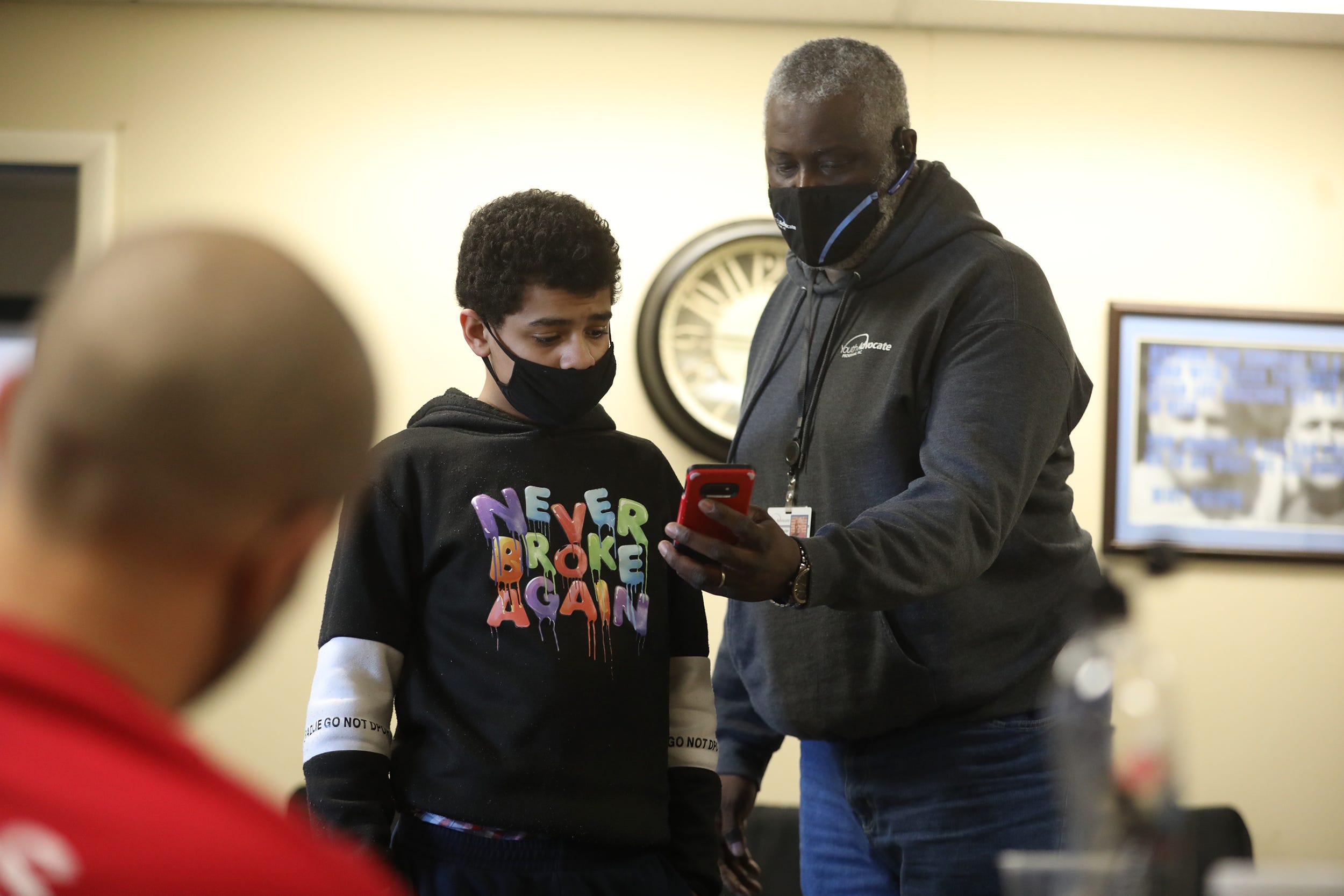 After his release from prison, James Schuler says he was on a mission to keep kids from prison, to "steal as many young people from that monster of a system." Schuler is shown here helping Kamal Nelson, 13, of Lyons, NY.
