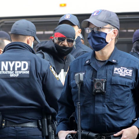 A protestor is arrested by New York City police af