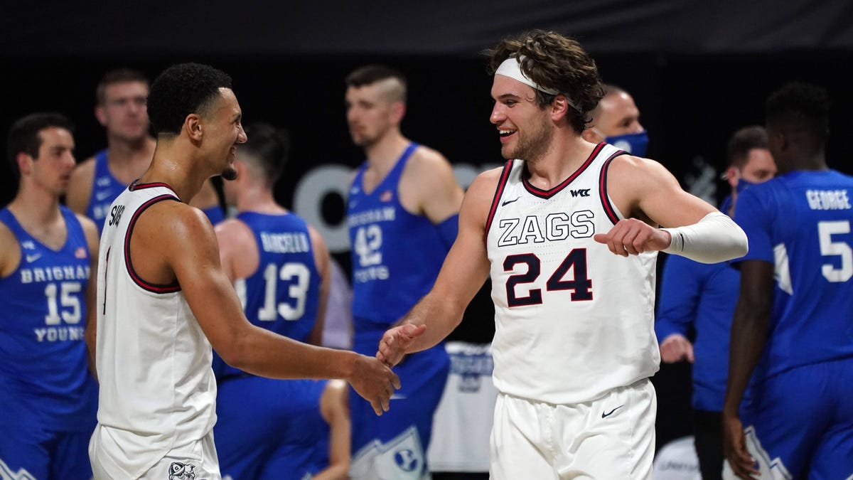 Gonzaga Bulldogs forward Corey Kispert (24) and guard Jalen Suggs (1) celebrate during the second half of the West Coast Conference Tournament championship game against the BYU Cougars at Orleans Arena.