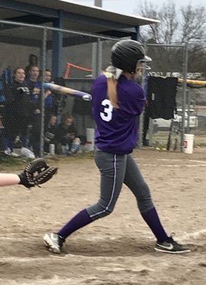 Hayley Lunsford follows through on a swing which resulted in a triple against Cedarville last Tuesday. The junior was 3-for-4 with 4 RBIs and 4 runs scored in the Ladycats’ 23-1 win.