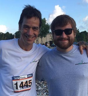 Marc Dunshee, left, began competing in triathalons and marathons after receiving a prosthetic leg made in part from hemp designed by Kyle Trivisonno (left). Trivisonno is moving his company, Human Plan Solutions, out of a Wichita State business incubator into a building at the Newton City/County Airport.
