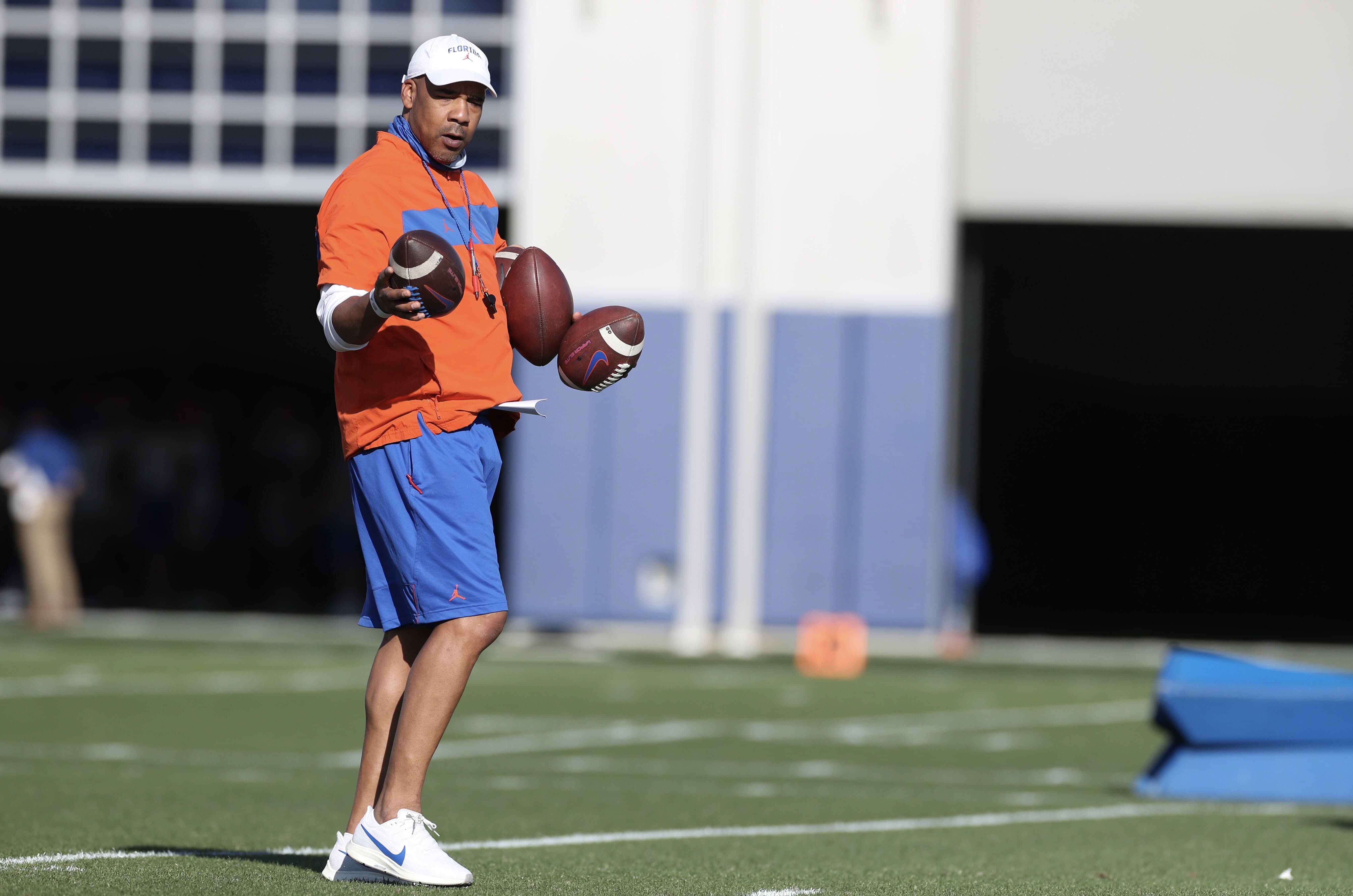 Garrick McGee relishes working with Dan Mullen, Gators quarterbacks Garrick McGee relishes working with Dan Mullen, Gators quarterbacks