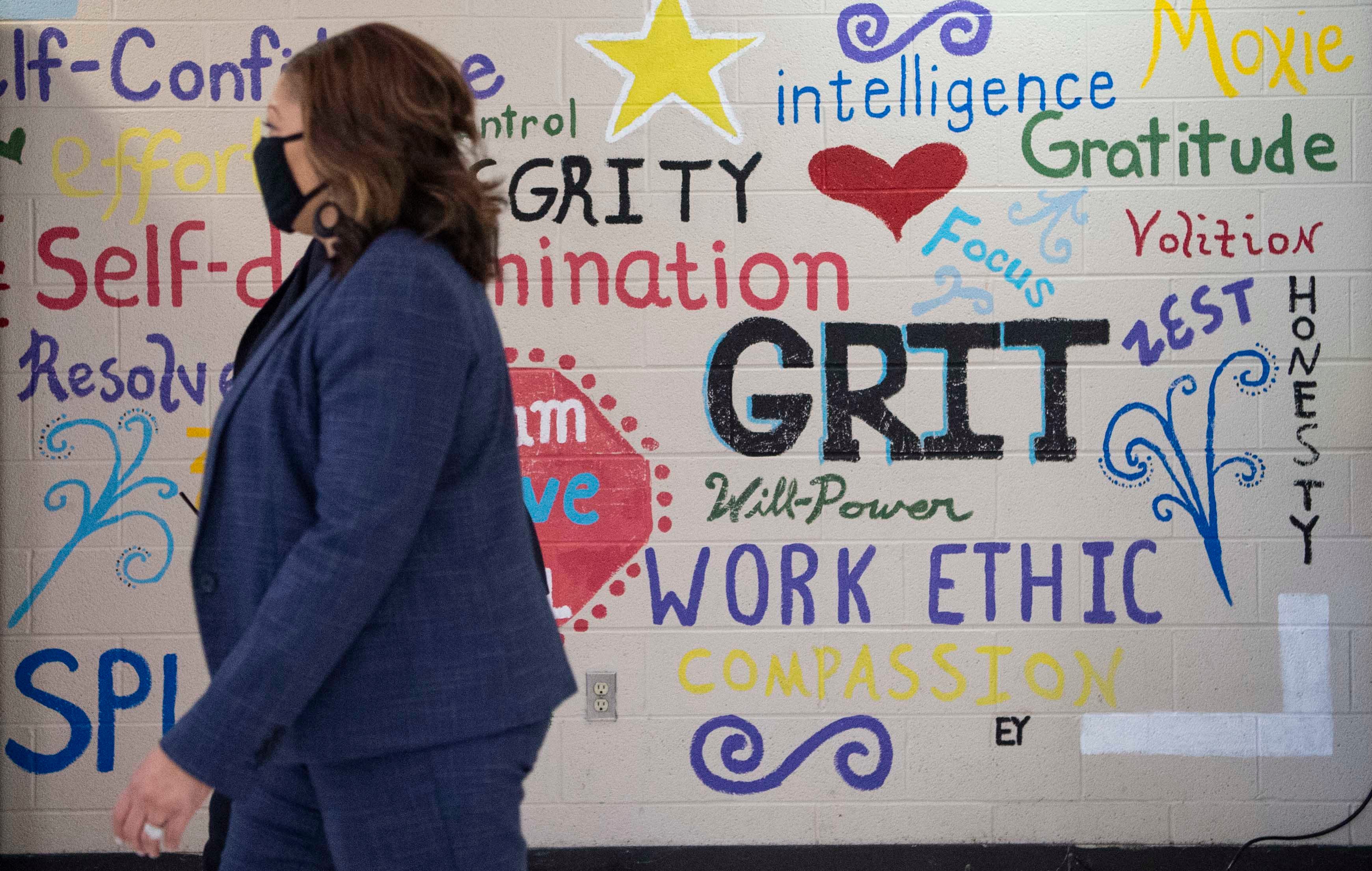 MNPS Director Dr. Adrienne Battle passes by a mural inside Antioch High School on Thursday, March 11, 2021.