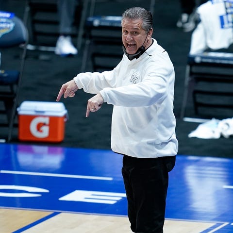 Kentucky head coach John Calipari works with his t