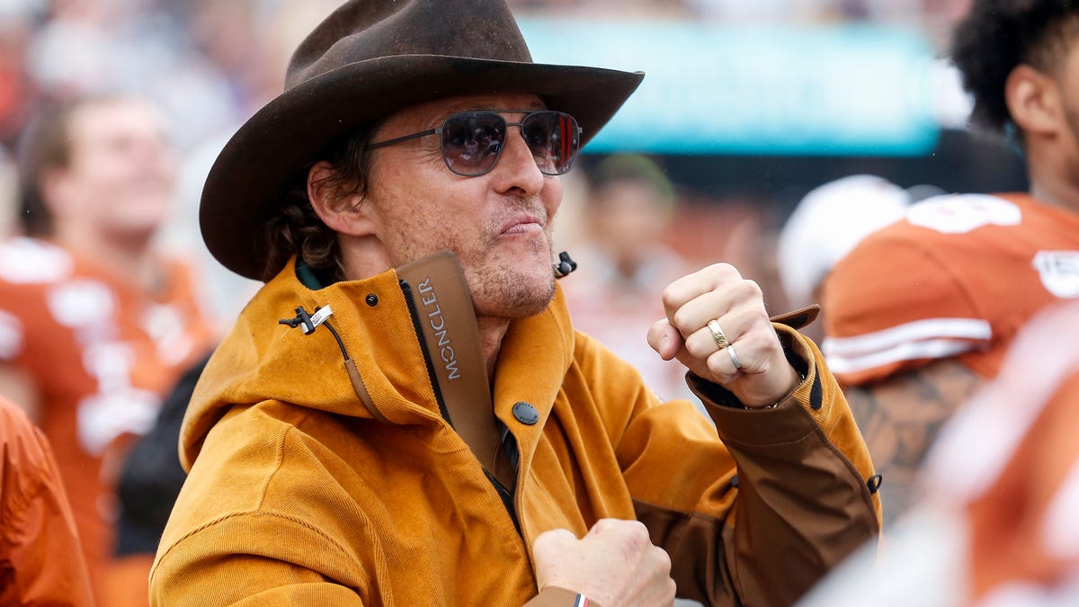 Matthew McConaughey celebrates on the Texas Longhorns sideline in the second half against the Texas Tech Red Raiders at Darrell K Royal-Texas Memorial Stadium on November 29, 2019 in Austin, Texas.