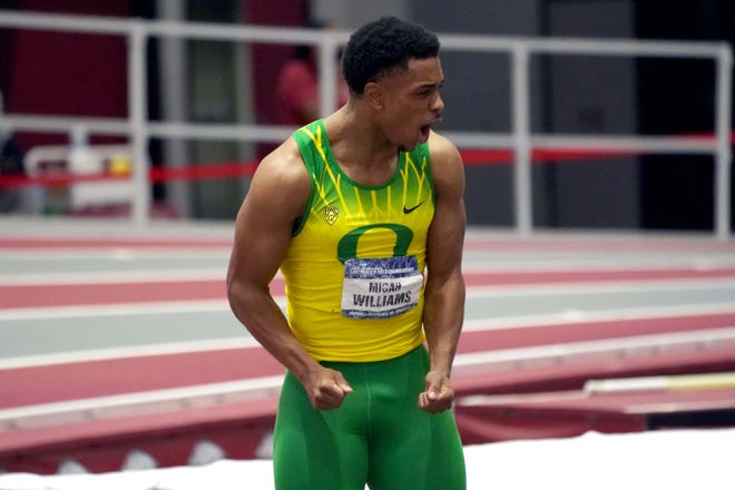 Oregon sprinter Micah Williams celebrates after winning the 60-meter final in 6.49 during the 2021 NCAA Indoor Track & Field Championship meet.