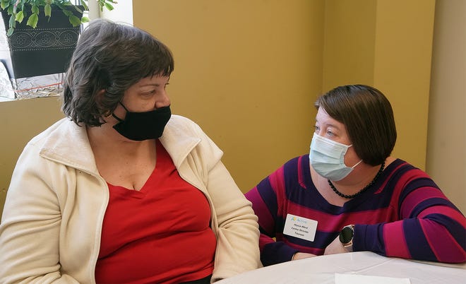 Active Day Taunton Director Alyssa Alturi, right, talks with Christine Gonsalves Wednesday March 3, 2021.