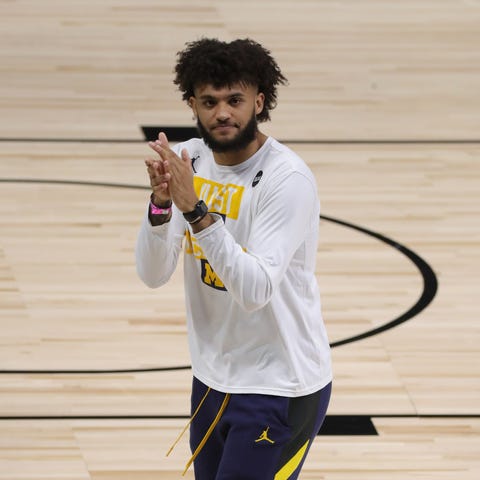 Michigan forward Isaiah Livers, out with a foot in