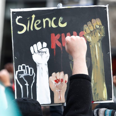 People marched during Breonna Taylor's memorial se