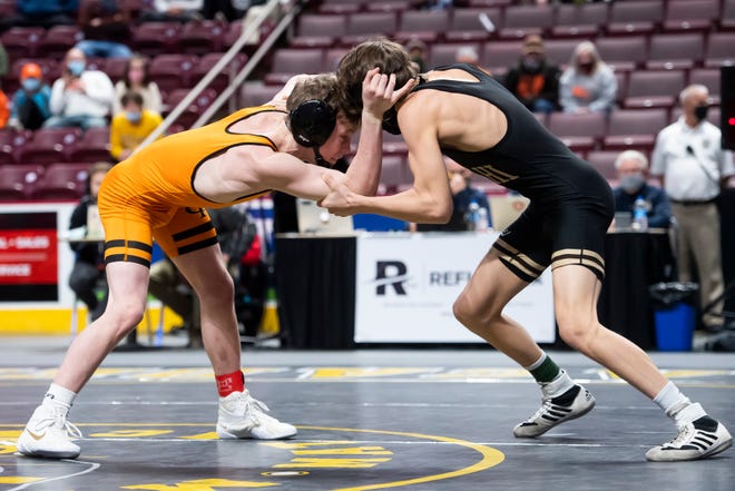Cathedral Prep's Jake Van Dee, left, wrestles Bethlehem Catholic's Cael McIntyre in a 113-pound semifinal bout at the PIAA Class 3A wrestling championship at the Giant Center in Hershey on Saturday, March 13, 2021. Van Dee won by decision, 4-2.