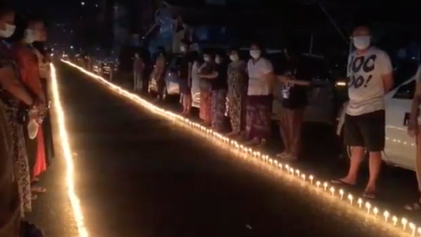 Yangon Residents Sing at Vigil Following Deadly Po
