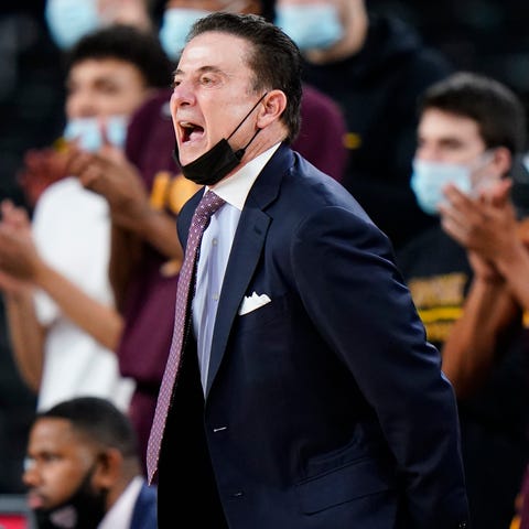 Iona head coach Rick Pitino yells to his team in t