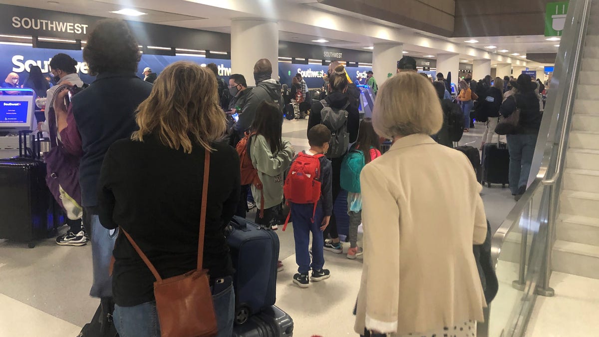 Travelers check in for Southwest Airlines flights at Phoenix Sky Harbor International Airport on Thursday, March 11.