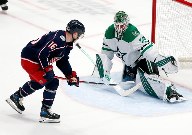 Blue Jackets forward Max Domi had some open space in his shootout attempt against Stars goaltender Jake Oettinger, but his shot sailed over the crossbar.