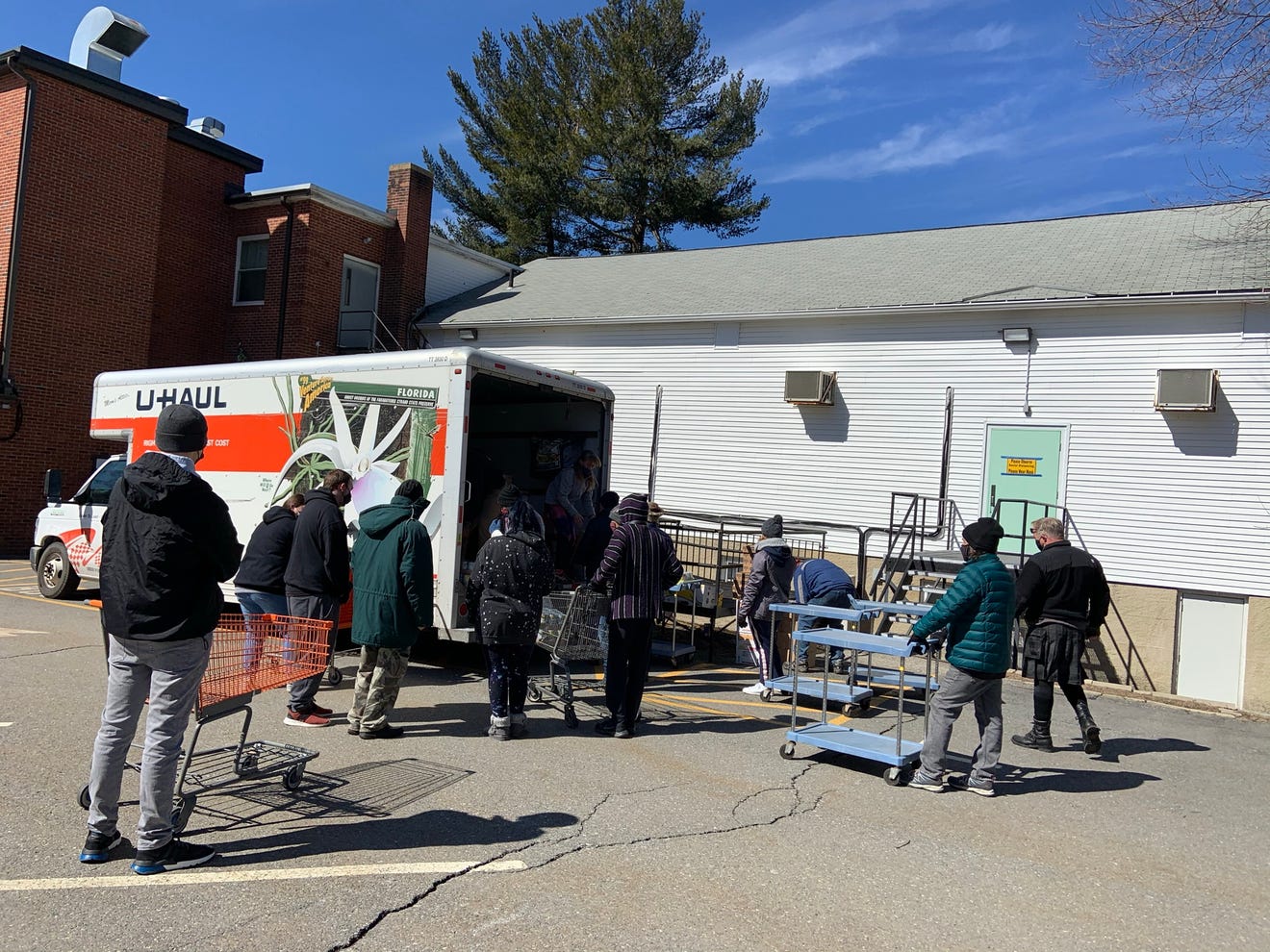 Volunteers unload Worcester County Food Bank delivery at ...