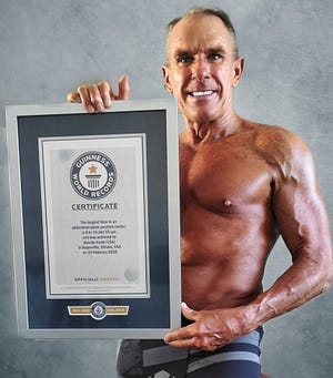 George Hood holds multiple board records - but the one he's best known for is the Guinness World Record for Longest Single Board, which he set in February 2020.
