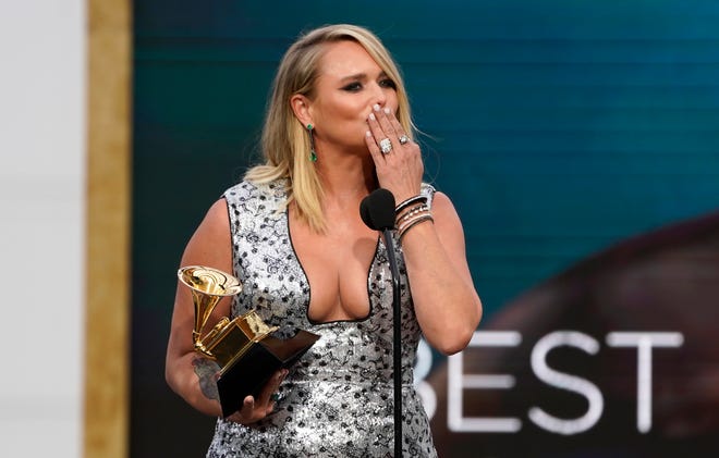 Miranda Lambert accepts the award for best country album for "Wildcard" at the 63rd annual Grammy Awards at the Los Angeles Convention Center on Sunday, March 14, 2021. (AP Photo/Chris Pizzello)