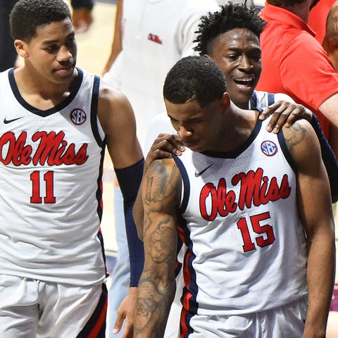 Mississippi Rebels guard Luis Rodriguez (15) react