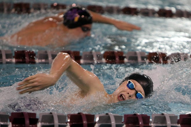 Burlington High School's John Cottrell swims in the boys 200 yard freestyle race, Tuesday Dec. 22, 2020 in Burlington. 
