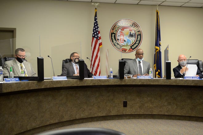 The Donaldsonville City Council returned to in-person meetings March 9. Shown, from left, are council members Michael Sullivan, Reginald Francis, Charles Brown, and Raymond Aucoin.