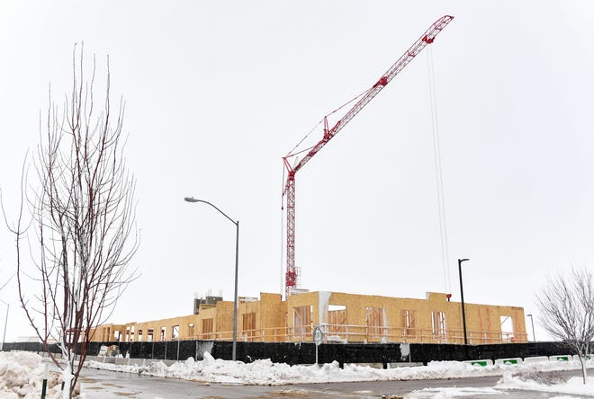 Construction work continues on Tuesday, March 16, 2021, on Success Street in northern in Sioux Falls.