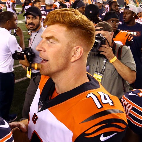 Andy Dalton (14) is apparently replacing Mitchell 