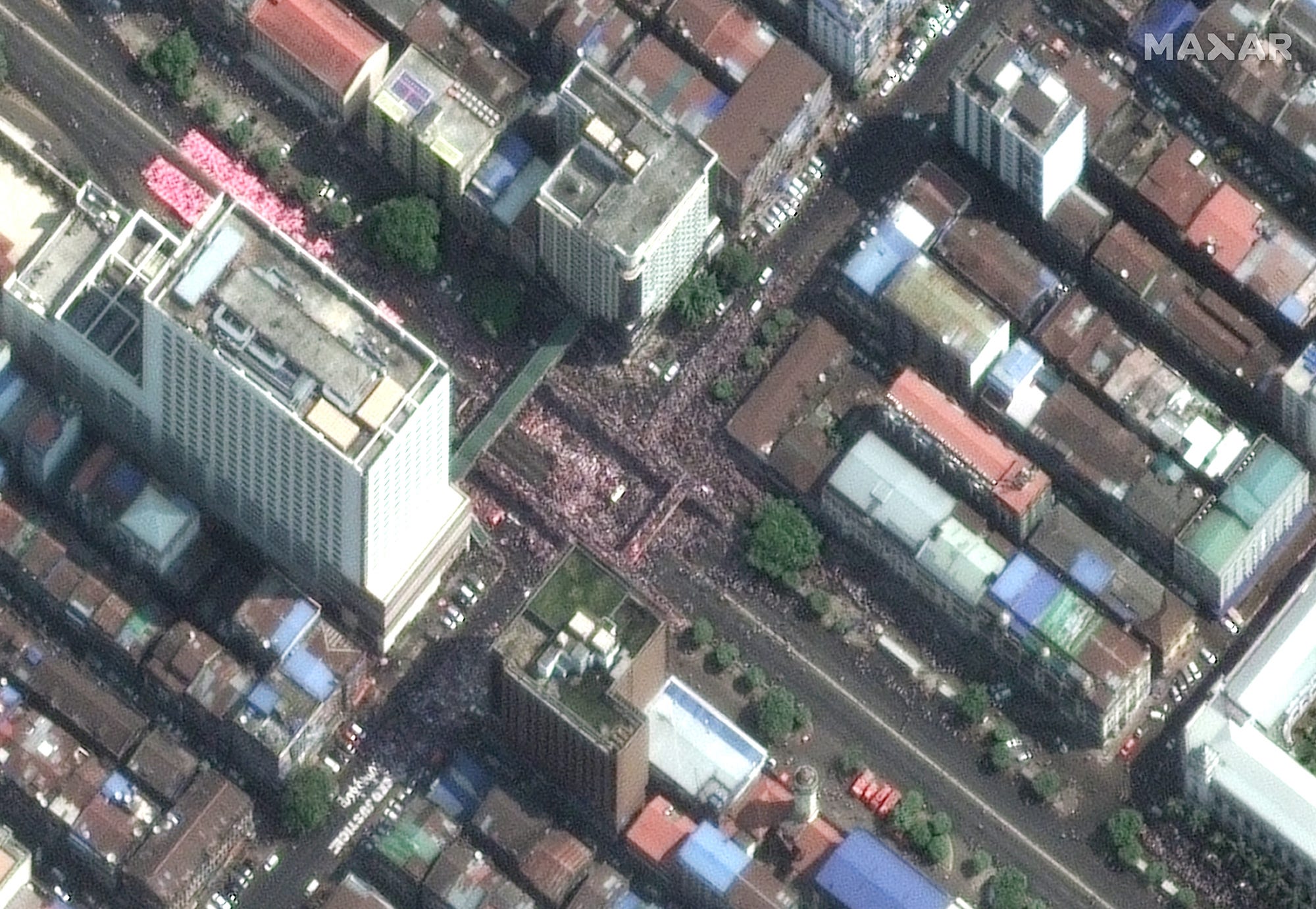 A large crowd of protesters gathered at Yangon’s Hledan junction.