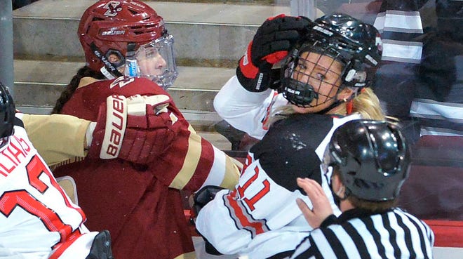 Tatum Skaggs, right, of Ohio State and Maddie Crowley-Cahill of Boston College each drew roughing penalties after a first-period tussle in the Buckeyes' NCAA quarterfinal victory.