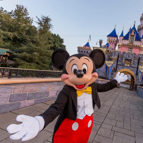 Mickey Mouse welcomes guests to Disneyland.