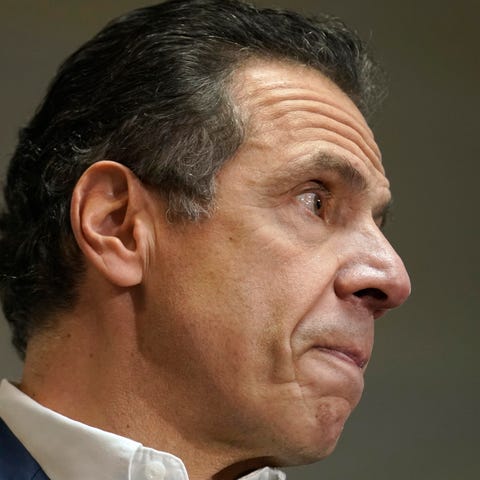 New York Governor Andrew Cuomo speaks before getti