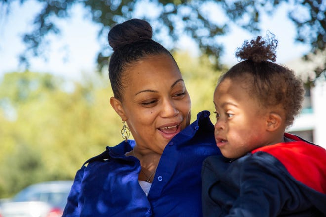 Renee Milam, 36, holds her son A'Zion, who has Down syndrome. Parents who are not raising a child with a disability can think about the message they are passing on to others and their non-disabled children, Deborah Cohen writes. [MEAGAN HOUSE for AMERICAN-STATESMAN]