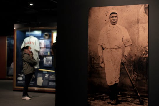 An exhibit at the National Baseball Hall of Fame in Cooperstown, Otsego County, shows photos and artifacts from the Negro league teams, on which Black and other minority athletes played from 1920-1948 when they were barred from playing on Major League Baseball teams.