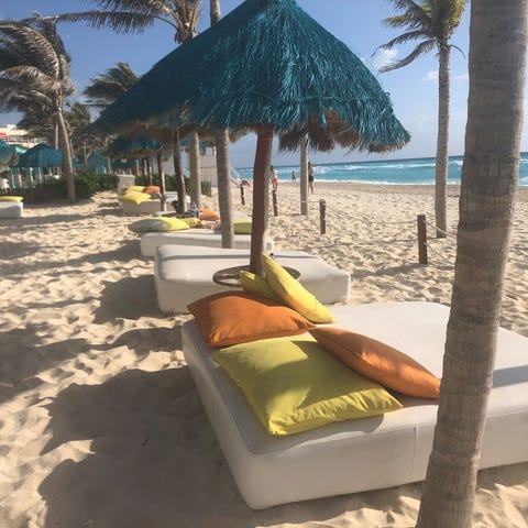 Beachfront day beds are available in Cancun, Mexic