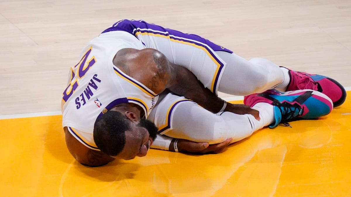 LeBron James of the Lakers indefinitely with a high right ankle sprain