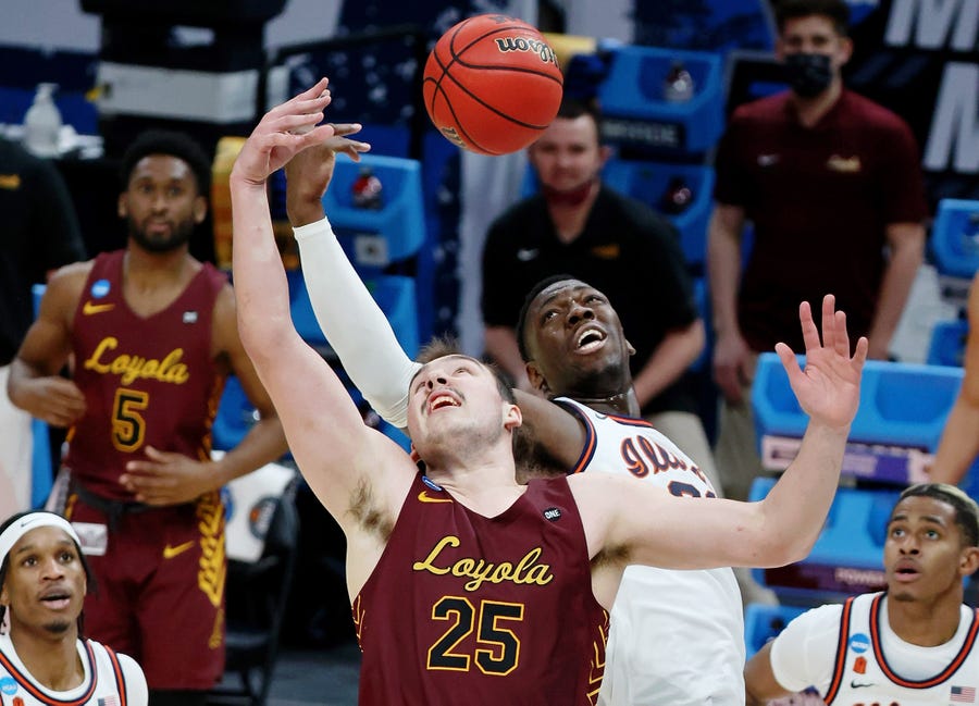 Loyola center Cameron Krutwig and the Ramblers knocked out No. 1 seed Illinois on Sunday.
