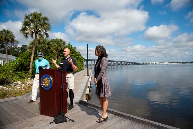 US Rep. Brian Mast (center) announces three new bills in an effort to prioritize human health and protect the St. Lucie River from Lake Okeechobee discharges on Monday, March 22, 2021, outside of his office in Stuart. Florida Oceanographic Society Executive Director Mark Perry (left) and South Florida Water Management District Governing Board Member Jacqui Thurlow-Lippisch joined Mast at the news conference on World Water Day.