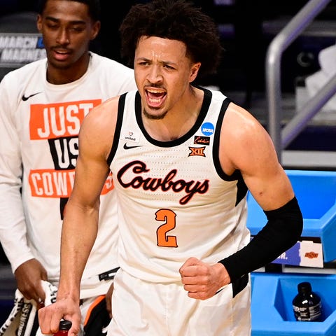 Oklahoma State guard Cade Cunningham (2) yells fro