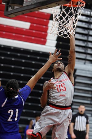 Southeastern Community College's Nariq Chisholm (25) puts up a shot during their home game against Iowa Western Community College Wednesday March 24, 2021 at SCC's Loren Walker Arena. 