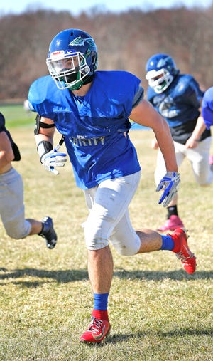 Tackle Liam Connor. Blue Hills VoTech Warriors football team members practice for the first game of the season on Wednesday, March 24, 2021.