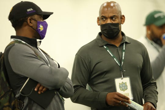 Coach Mel Tucker, right, talks with a Minnesota Vikings scout during Michigan State football's pro day March 24, 2021.