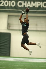 Shakur Brown goes through drills during Michigan State football's pro day March 24, 2021.