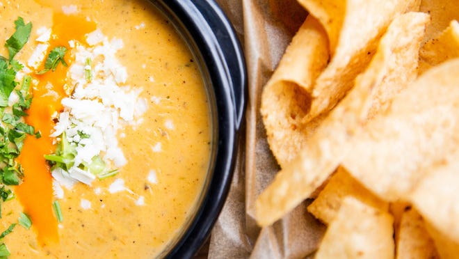 Green chile queso from Torchy's Tacos is coming to a new South Austin location.