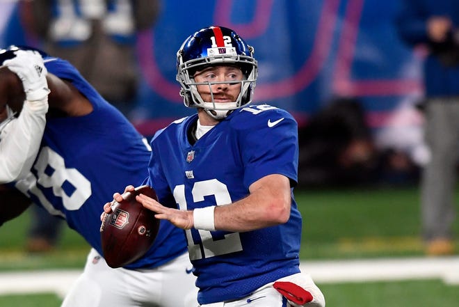New York Giants quarterback Colt McCoy (12) looks to throw against the Cleveland Browns in the second half. The Giants lose to the Browns, 20-6, at MetLife Stadium on Sunday, December 20, 2020, in East Rutherford.

Nyg Vs Cle