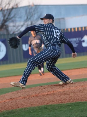 Shawnee right-hander Daniel Campbell delivers a pitch against Guthrie Thursday at Memorial Park. Campbell allowed just four hits and struck out 15 in the Wolves' 5-1 win over the Bluejays.