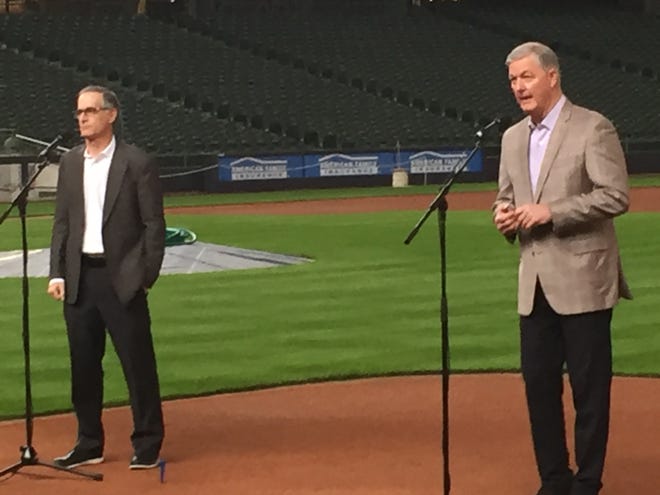 Rick Schlesinger, Milwaukee Brewers president of business operations (left) and Tim Sheehy,  Metropolitan Milwaukee Association of Commerce president, speak to reporters Friday at American Family Field.