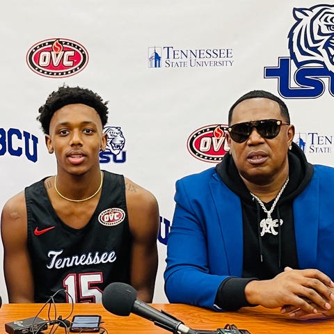 Hercy Miller, left, with his father hip-hop legend